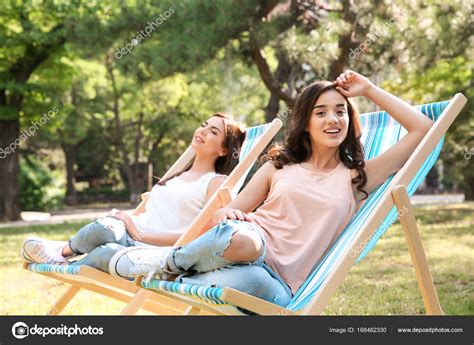 29,027 Young Women Sunbathing Stock Photos & High